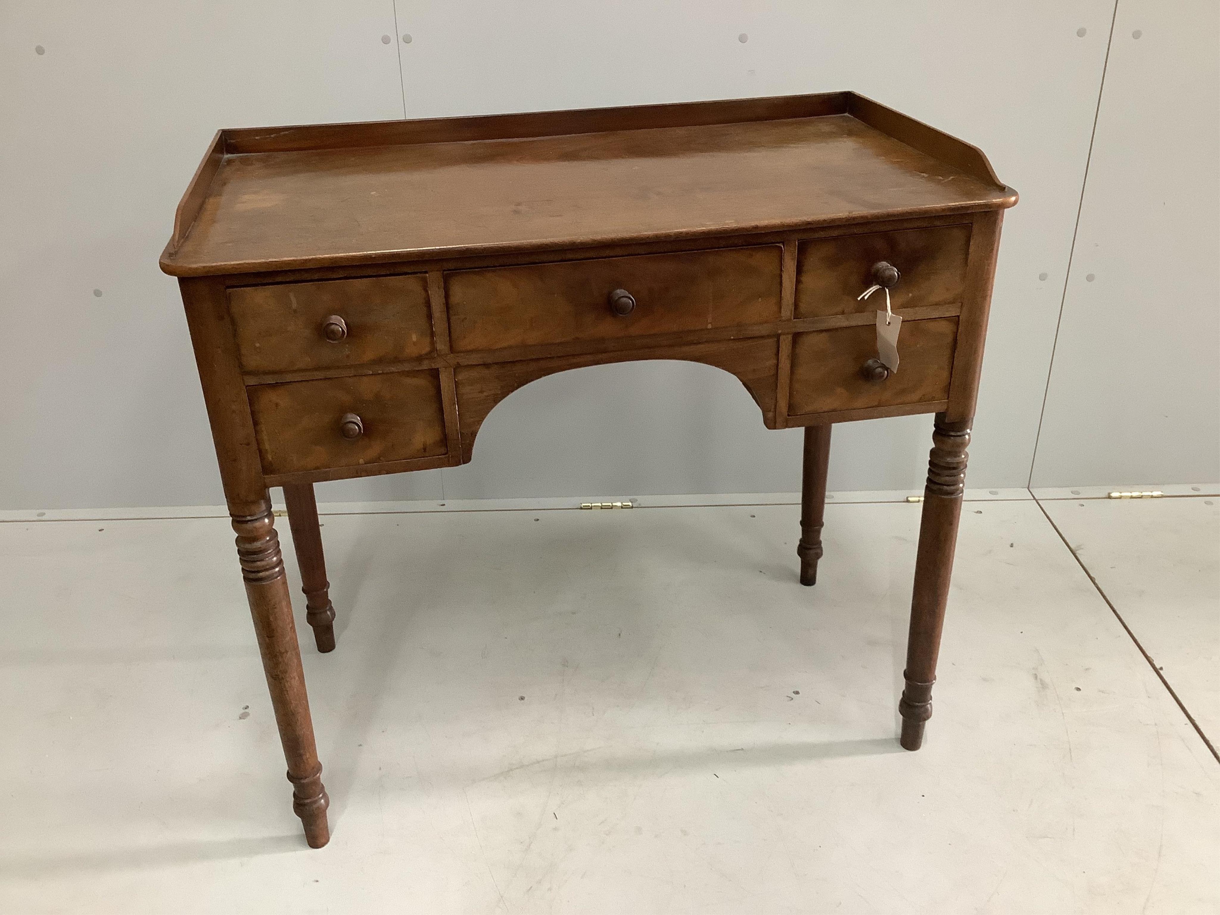 A Regency mahogany kneehole dressing table, width 93cm, depth 50cm, height 85cm